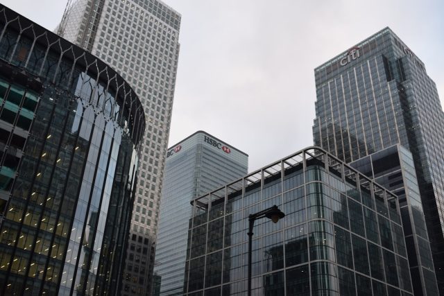 Credit Suisse fined $475 million for role in Mozambique tuna bond scandal A Credit Suisse office building with a sign displaying the bank's name, symbolizing the financial institution at the center of the Mozambique tuna bond scandal.
