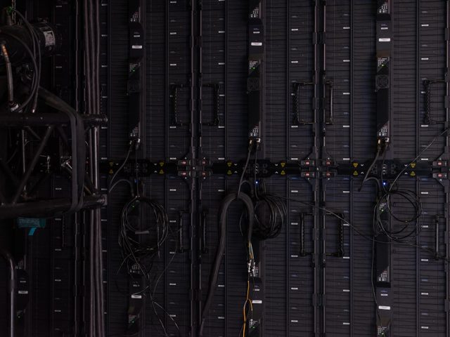 Anthropic refused Pentagon demand to drop AI weapons ban, prompting legal halt A Claude AI chatbot interface on a screen with a gavel and legal documents nearby, symbolizing the legal dispute over AI weapons restrictions.