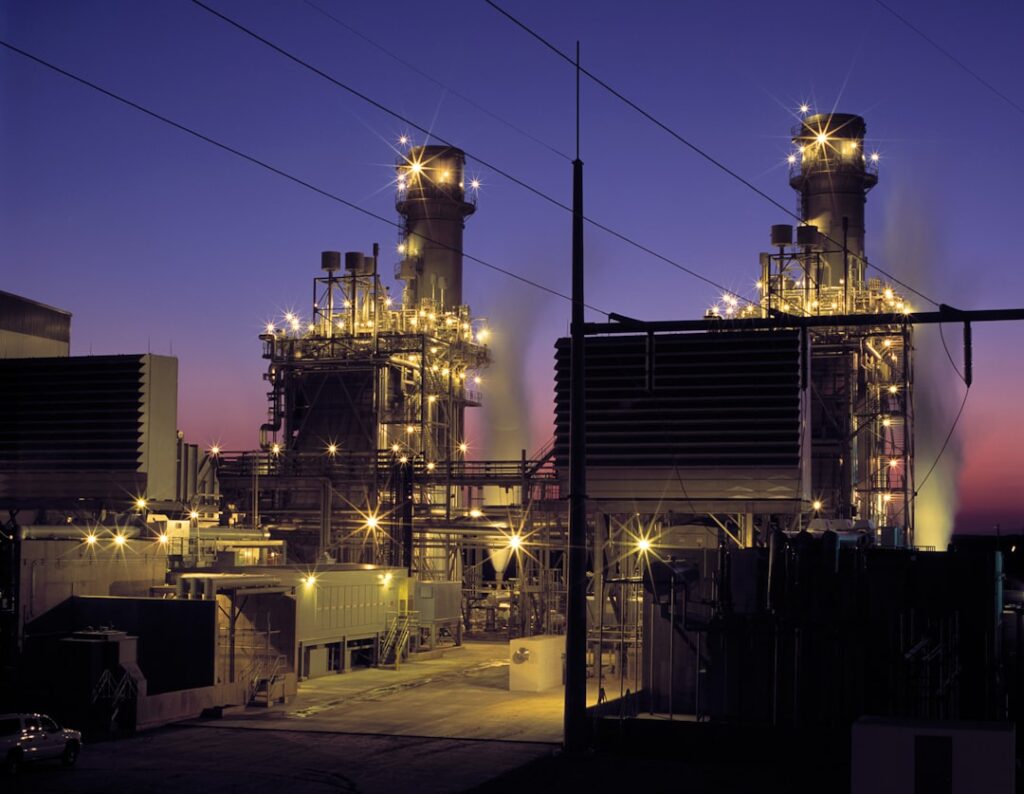 Research analyst Robert Rozansky reviews a map of Asia's planned liquefied natural gas terminals and pipelines.