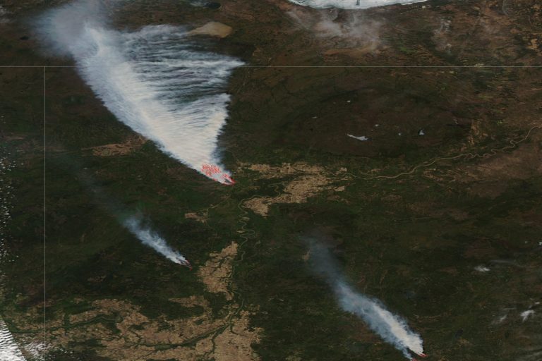 Alberta wildfires and U.S. sanctions cast dual pall over energy heartland