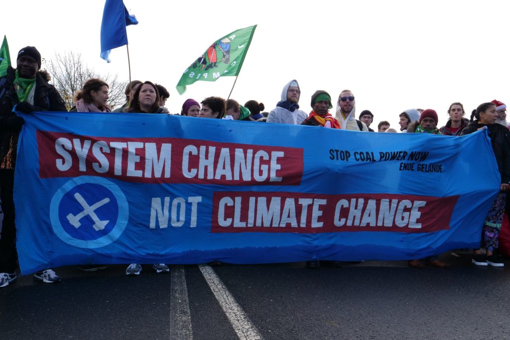 Fossil fuel ad ban sparks debate over loopholes and enforcement