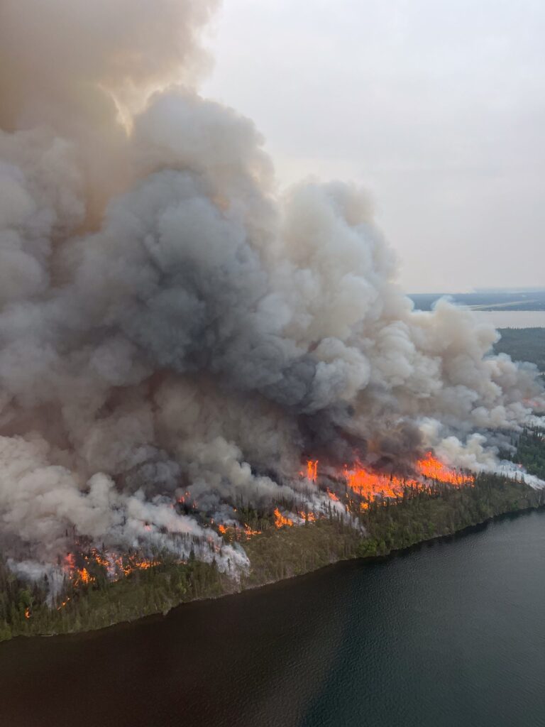 Canadian Wildfires Claim Two Lives as Provinces Brace for Emergency