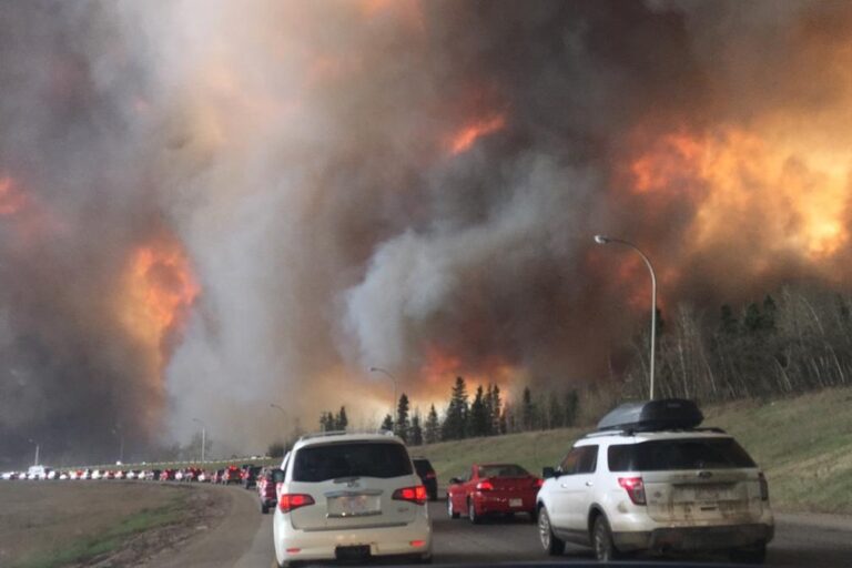 Alberta Wildfires Cut 344,000 Barrels Daily, Threatening 470,000 More