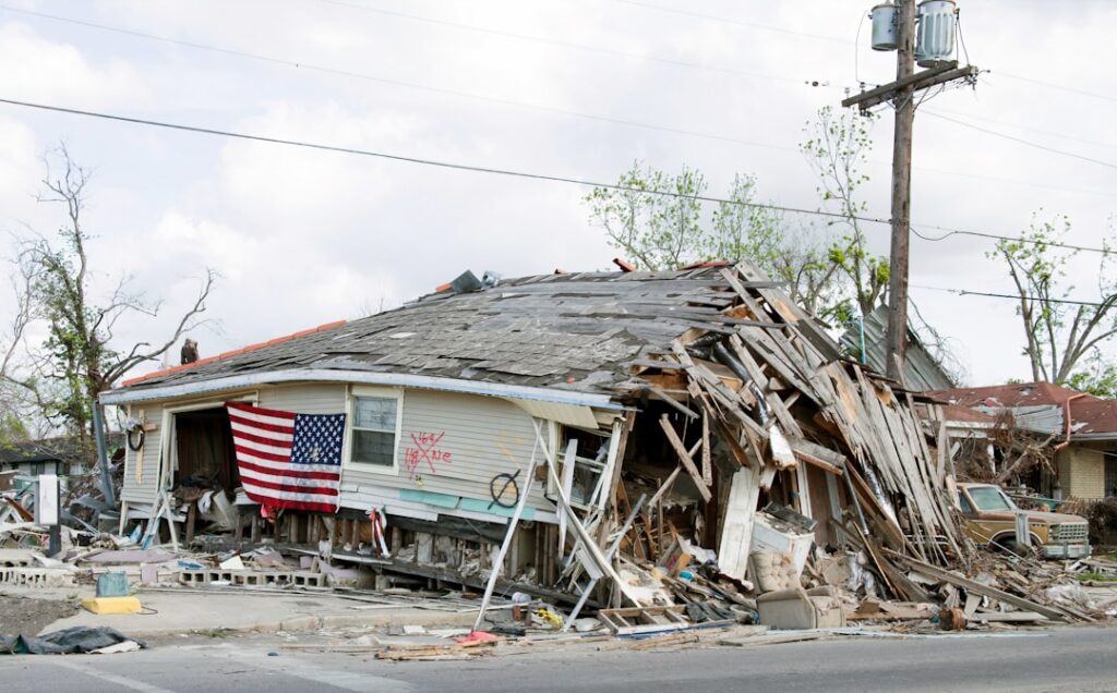 Rescue workers search through debris in a tornado-damaged neighborhood after a deadly outbreak across multiple states.