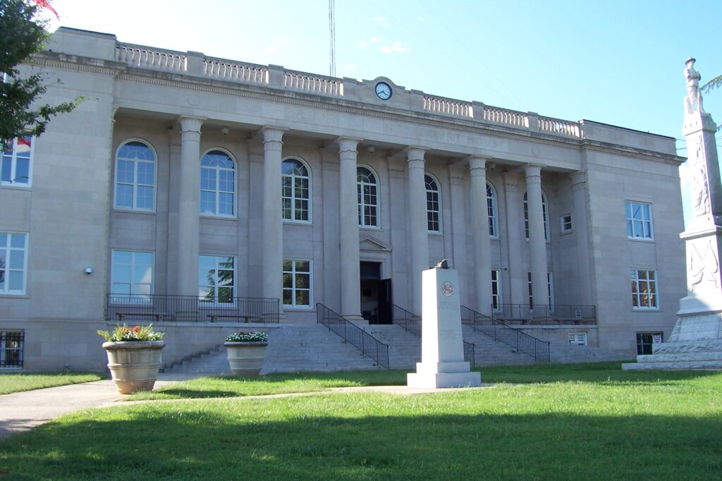 Emergency officials direct residents to evacuate as floodwaters rise near Lake Lure Dam in Rutherford County, North Carolina.