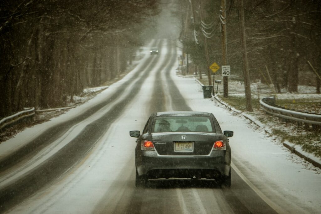 Snow-covered roads and damaged power lines in a residential area after a winter storm