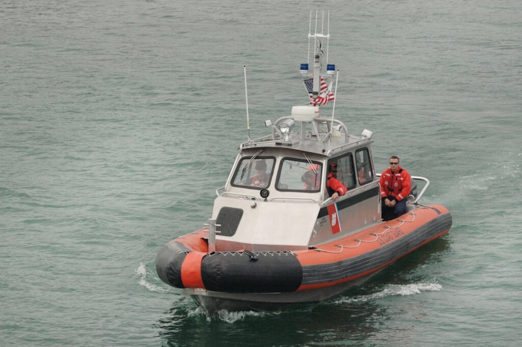 A Coast Guard rescue boat navigates the turbulent waters of the St. Lucie Inlet near Hutchinson Island.