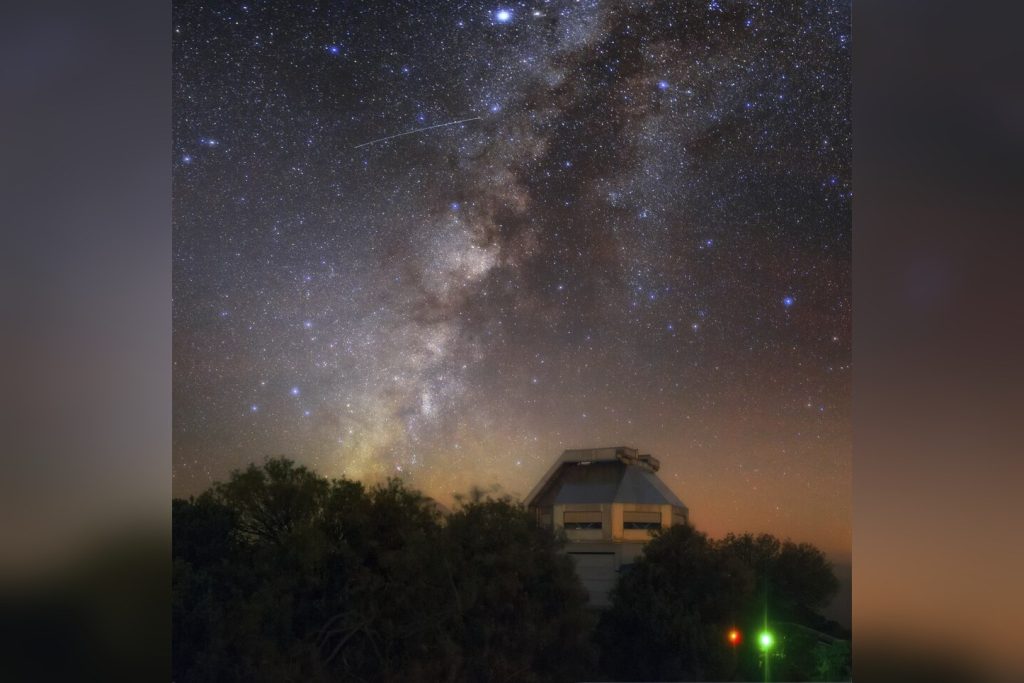 Satellite Streaks Across Night Sky